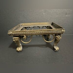 Vintage ornate brass stand with lion paw feet